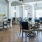 set tables in bright dining room