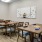 game tables and chairs in bright game room